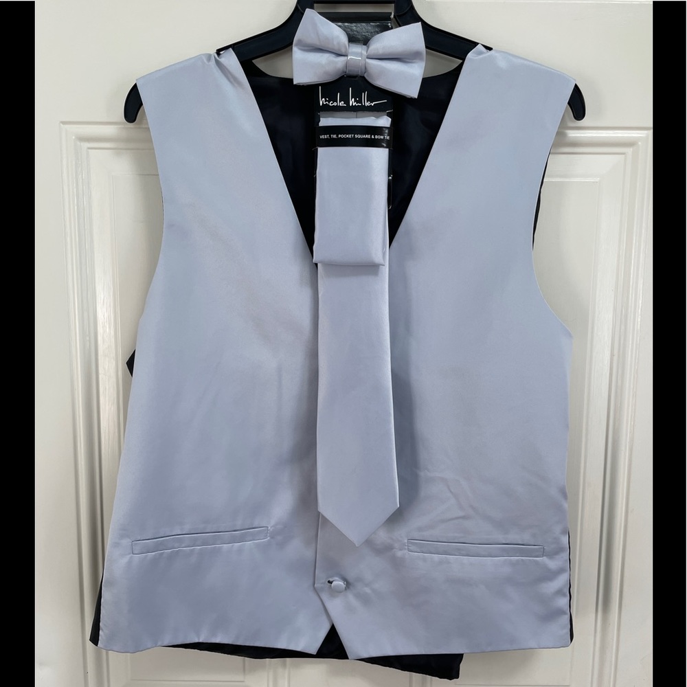 New formal vest, tie, pocket square and bow tie set.